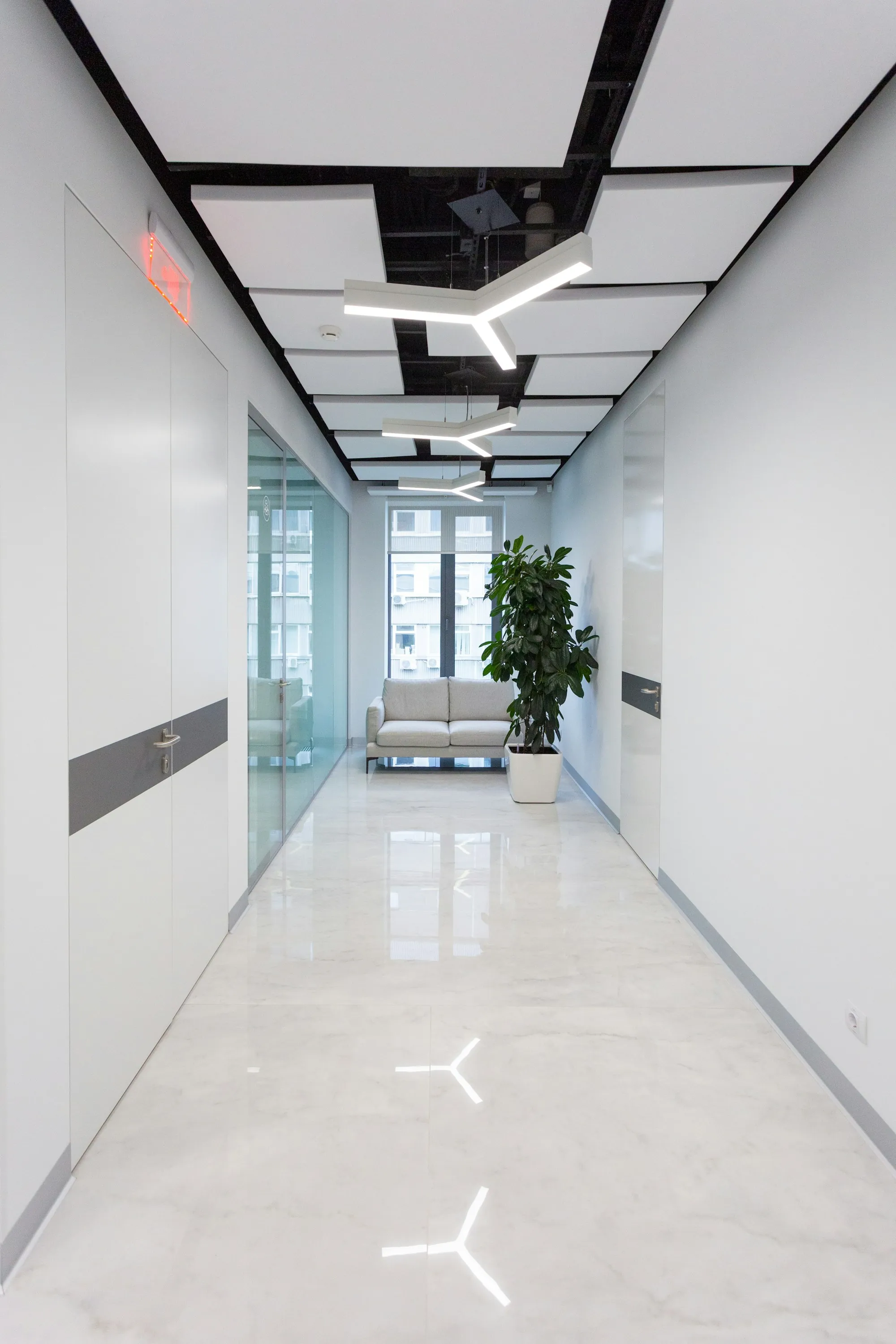 White office corridor with a glossy floor